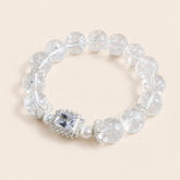 Clear quartz crystal bracelet with round beads, pearl accents and sparkling centerpiece for clarity and energy healing