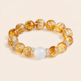Natural citrine bracelet with golden crystal beads, white center bead and sparkling spacers for wealth, success and healing