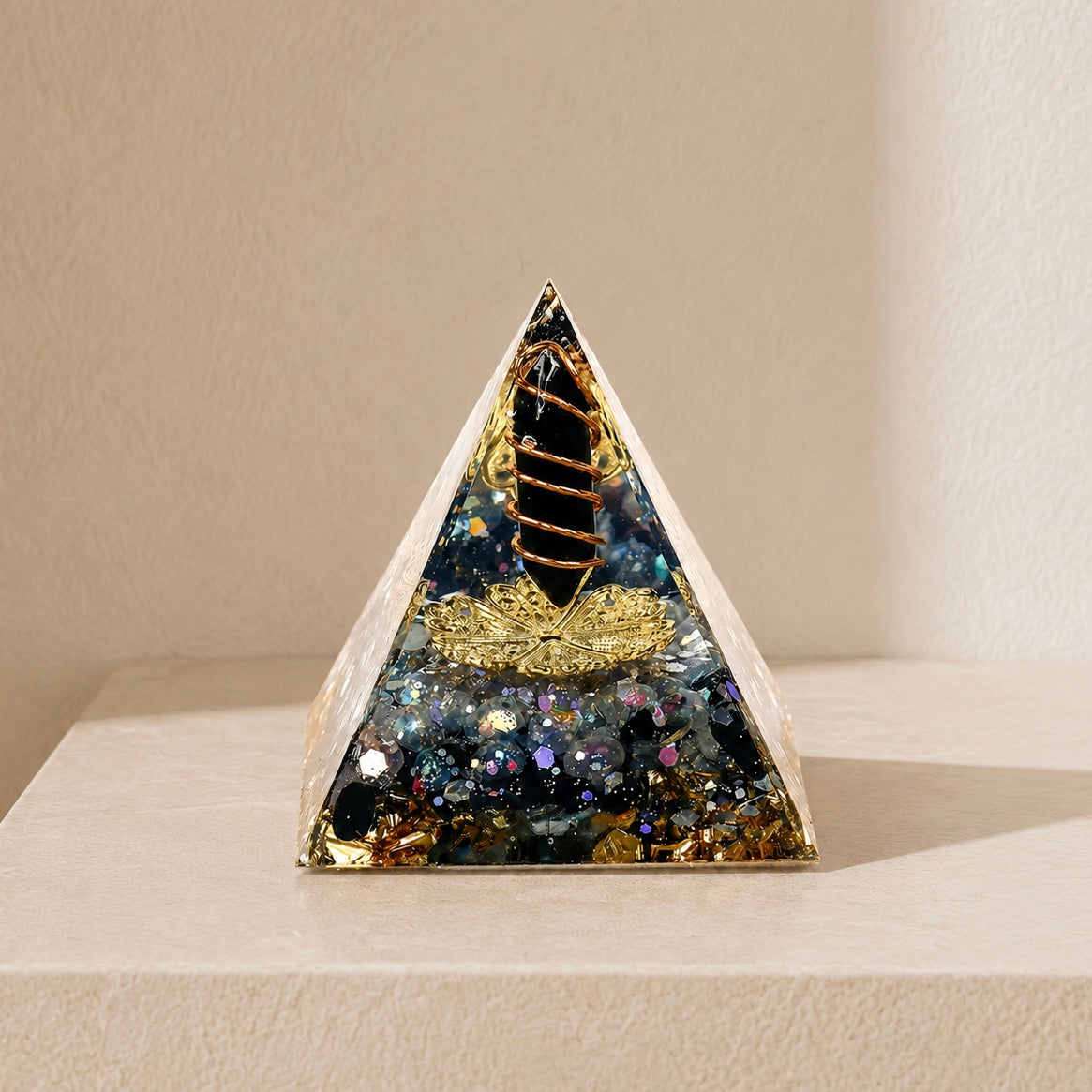 Protection and energy shield orgonite pyramid diagram showing obsidian crystal pillar, labradorite, copper wire, gold foil and decorative elements