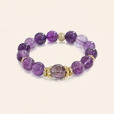 Uruguayan Amethyst Quartz bracelet with gold accents on background