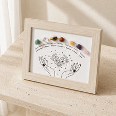 Chakra crystal healing stones display frame on beige stone shelf for energy balance and spiritual home decor