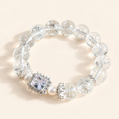 Clear Quartz and Zircon bracelet with round clear beads, pearl accents and sparkling centerpiece