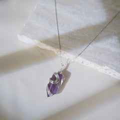 High clarity amethyst pendant with silver wire craftsmanship