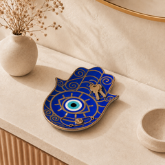 Blue Hamsa Evil Eye Ceramic Trinket Dish for keys, jewelry, and daily essentials styled as spiritual protection decor in an entryway.