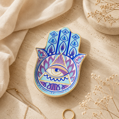 Hamsa Evil Eye Ceramic Trinket Dish for rings, jewelry, keys, and crystals with mystical blue purple eye design.