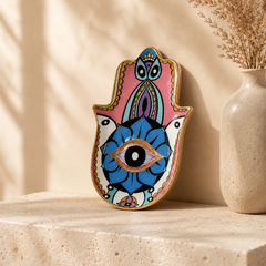 Pastel Hamsa Evil Eye Ceramic Trinket Dish with glossy finish displayed as spiritual protection decor on a neutral shelf.