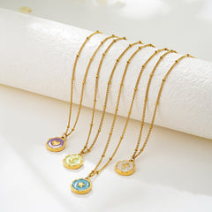 Gold heart charm necklace with purple enamel, perfect for self-love and gifts