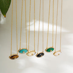 Boho spiritual necklace with turquoise crystal evil eye pendant