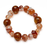 Red Rutilated Quartz bracelet with natural rutile inclusions for passion and prosperity