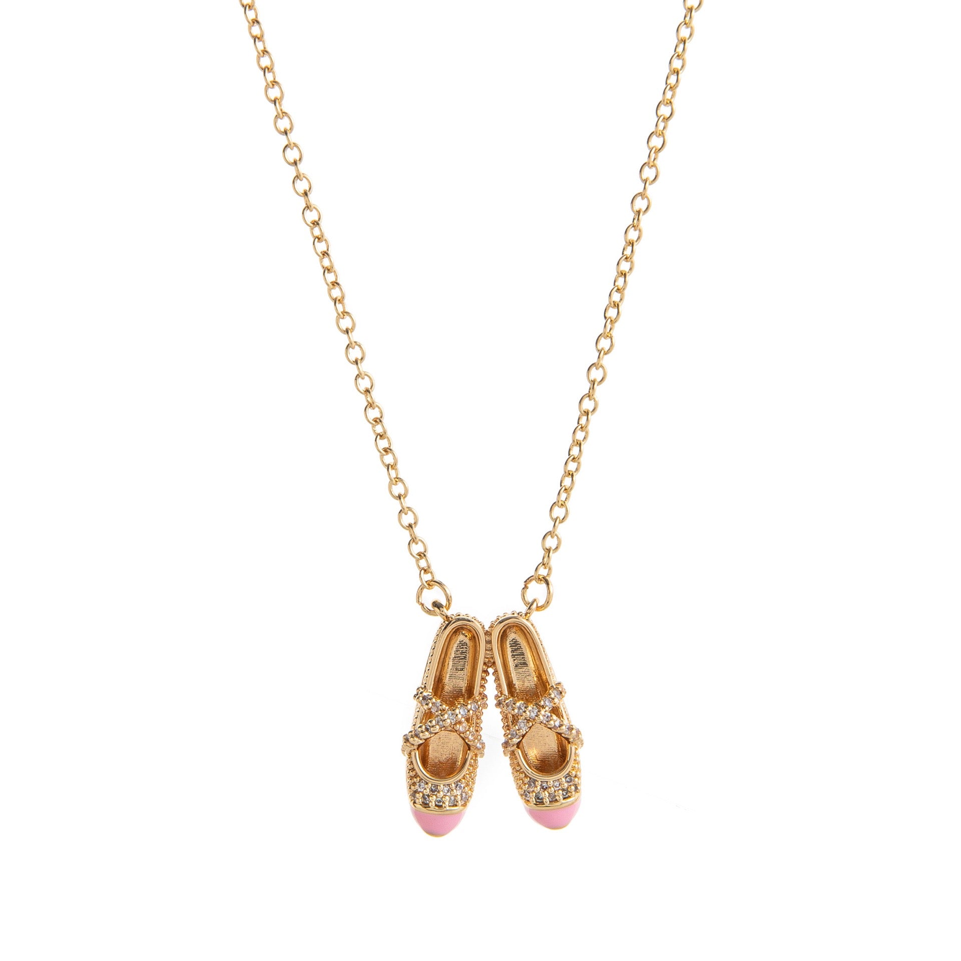 pink ballet shoes necklace in a jewelry box with gold chain and sparkling details