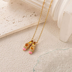 dainty pink ballet shoes necklace with soft feminine balletcore design