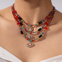 Evil eye charm necklace on model, spiritual and bold look