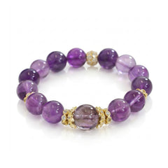 Uruguayan Amethyst Quartz bracelet with gold accents on a white background