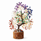 chakra feng shui crystal tree on white background with wooden base for balance and positive energy