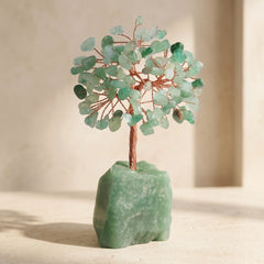 Feng shui crystal tree with green aventurine gemstone leaves and natural green stone base for harmony, luck and protection