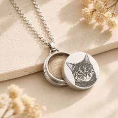 Silver twist-open pet memorial keepsake necklace with engraved cat portrait and space for pet fur or tiny memories.