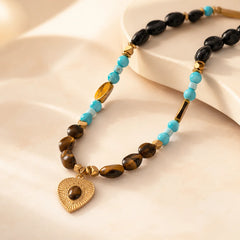 Layered healing crystal necklace with warm tiger eye tones and minimalist boho jewelry style