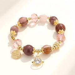 Peach Oolong Saturn Pendant Crystal Bracelet - Auratract
