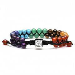 Adjustable chakra bracelet made of natural healing crystals, perfect for yoga and meditation.