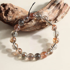 Elegant and powerful Black Gold Rutilated Quartz bracelet, perfect for energy balance.