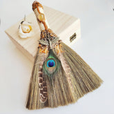 Handmade witch broom with peacock feather and healing crystal