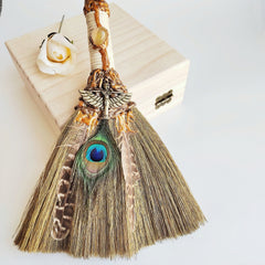 Handmade witch broom with peacock feather and healing crystal