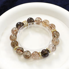 Golden rutilated quartz and smoky quartz bracelet for wealth, grounding, and energy healing
