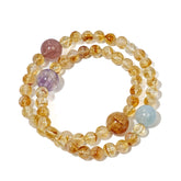Multi-crystal bracelet with Citrine for abundance and Amethyst for wisdom