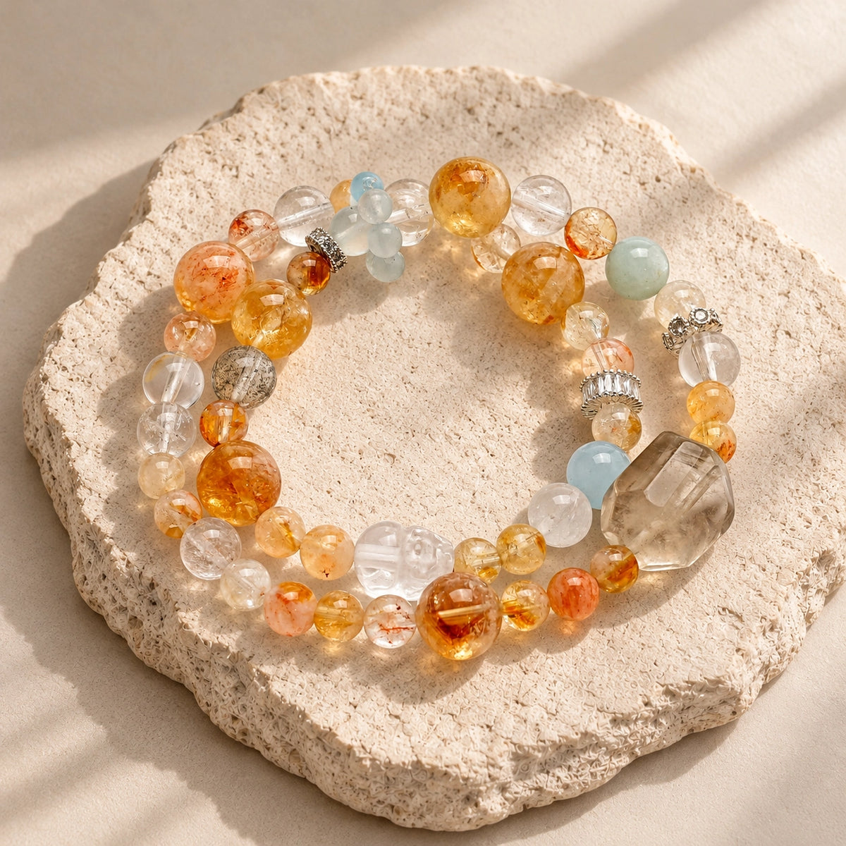 Overhead view of Citrine and Aquamarine crystal bracelet with five natural stone varieties