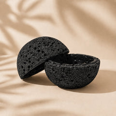 Black volcanic-texture lidded bowl displayed open as sculptural home decor