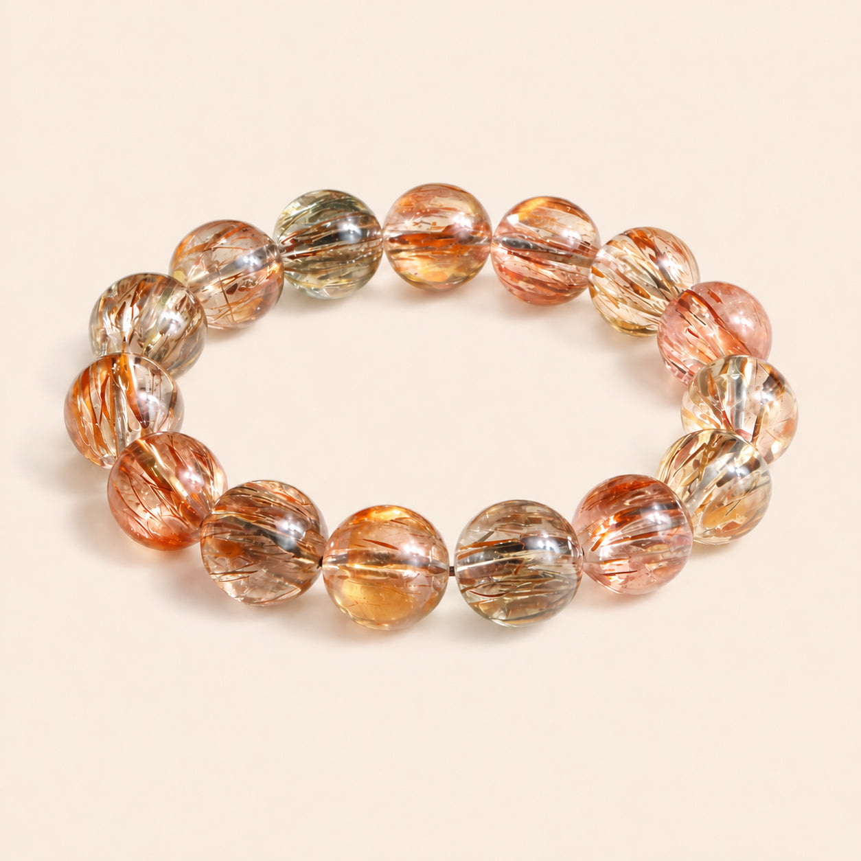 Natural Black Gold Rutilated Quartz bracelet with glossy round crystal beads