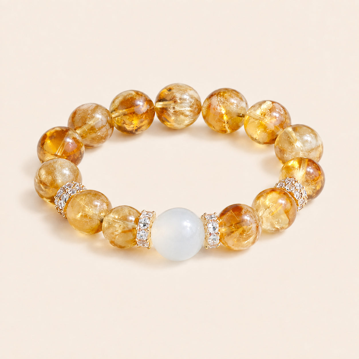 Natural citrine bracelet with golden crystal beads, white center bead and sparkling spacers