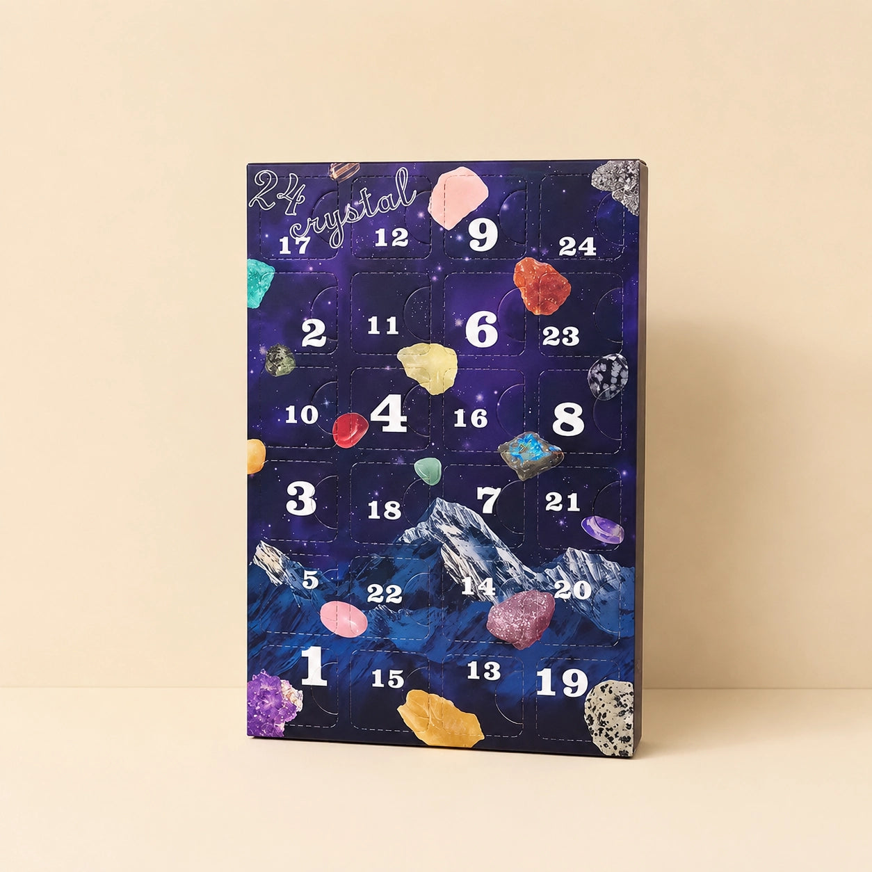Holiday themed galaxy crystal gift set designed as 24 day gemstone countdown calendar for gifting and collection