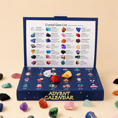 Open Christmas crystal advent calendar showing numbered compartments with natural gemstones inside