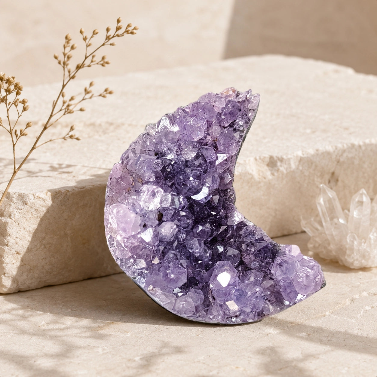 Natural Amethyst Crescent Moon crystal decor displayed with clear quartz for calm energy and spiritual clarity.