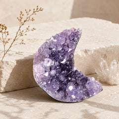 Natural Amethyst Crescent Moon crystal decor displayed with clear quartz for calm energy and spiritual clarity.