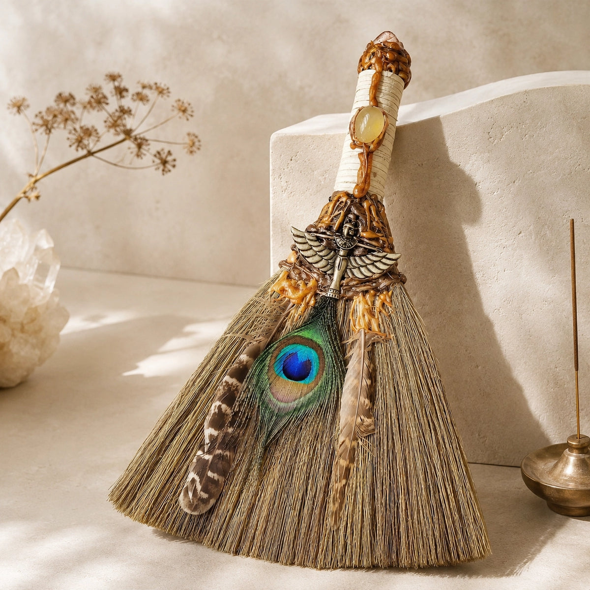 Handmade Peacock Feather Witch Broom with natural straw, crystal accent, and feather details for energy cleansing and altar decor.