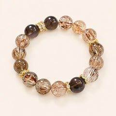 Smoky quartz and black gold rutilated quartz stretch bracelet with smoky brown and transparent included quartz beads