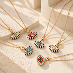 Six evil eye pendant necklace styles with colorful enamel, zircon center stones, and gold plated chains.