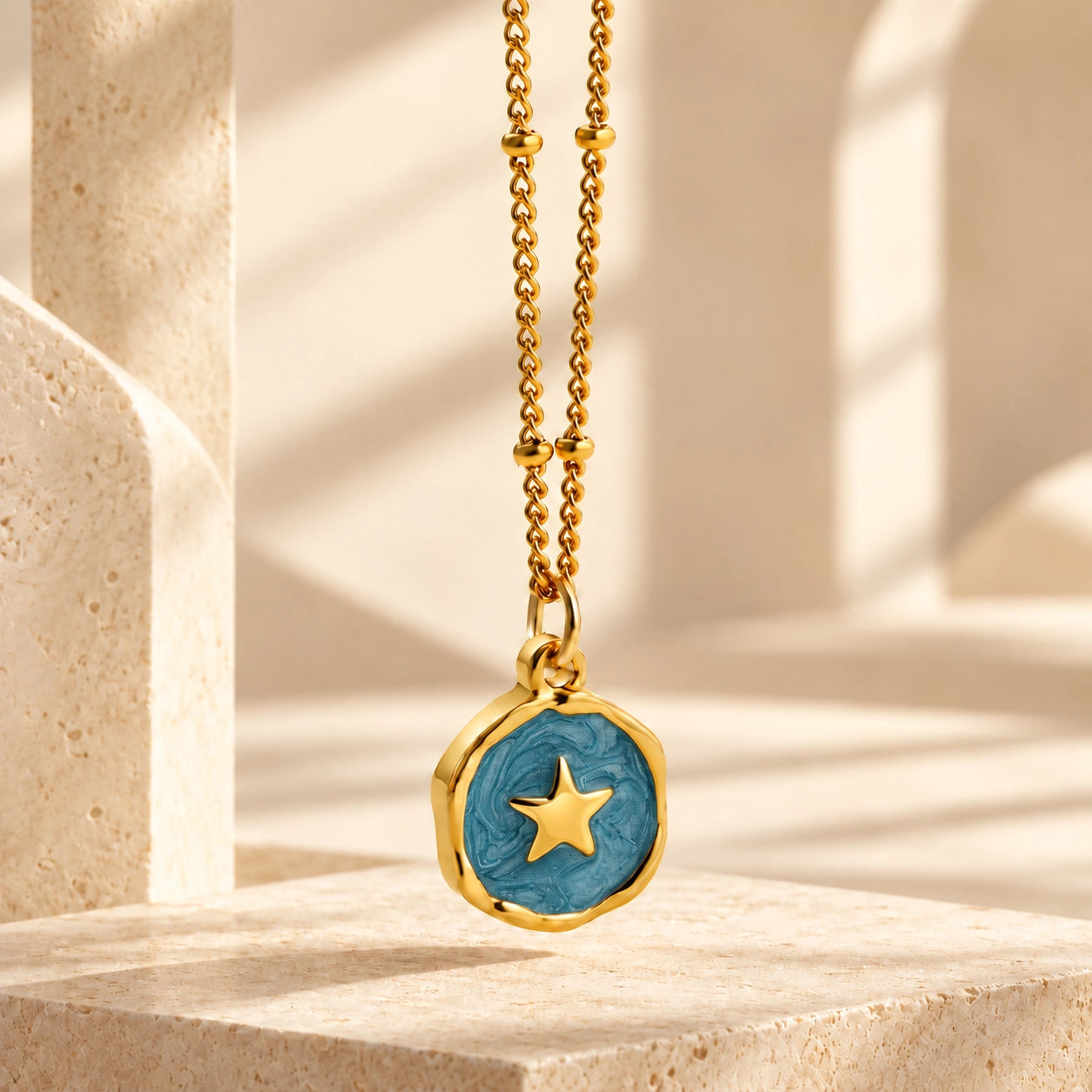 Blue enamel Star charm necklace with gold-tone copper chain, a symbol of hope and guidance
