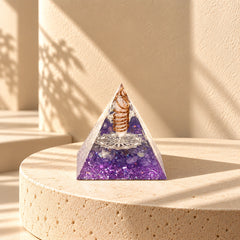 Amethyst and clear quartz orgonite pyramid with double-helix copper coil and purple foil accents