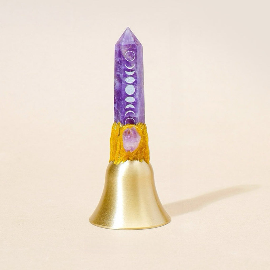 amethyst crystal point bell with moon phase symbols