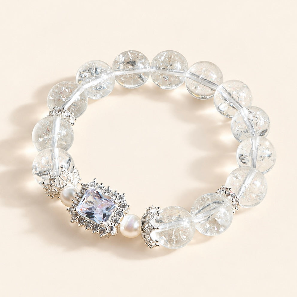 Clear Quartz and Zircon bracelet with round clear beads, pearl accents and sparkling centerpiece