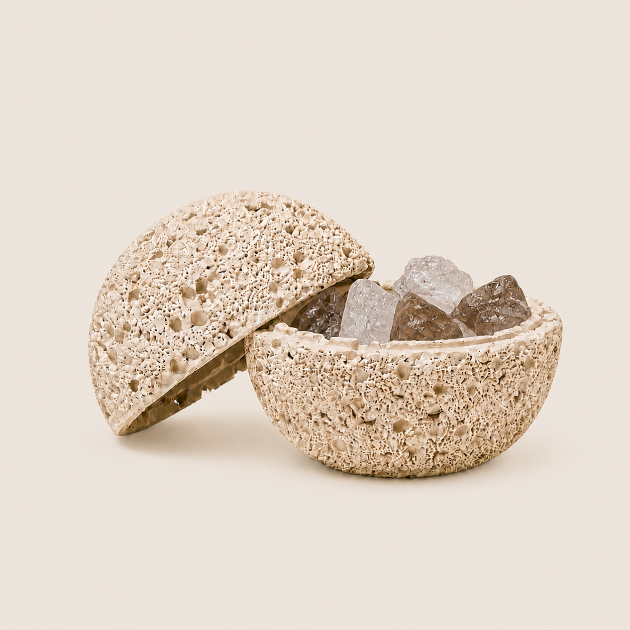 Beige volcanic-texture crystal cleansing bowl with lid holding clear and smoky quartz