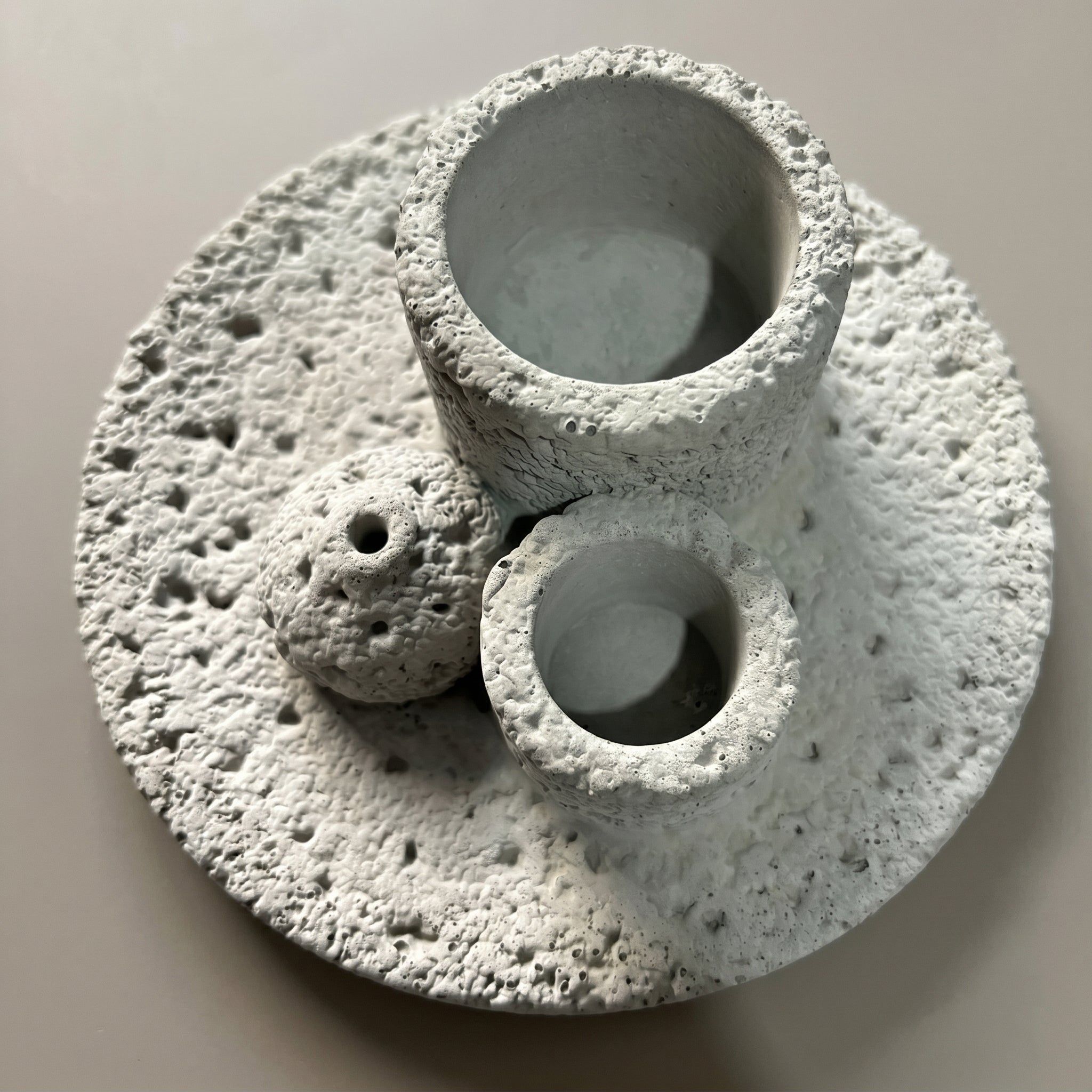 Multi-functional smudge bowl and Palo Santo holder in modern concrete design for cleansing rituals