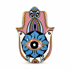 Pastel Hamsa Evil Eye Ceramic Trinket Dish with protective eye design styled as soft spiritual home decor beside fabric.
