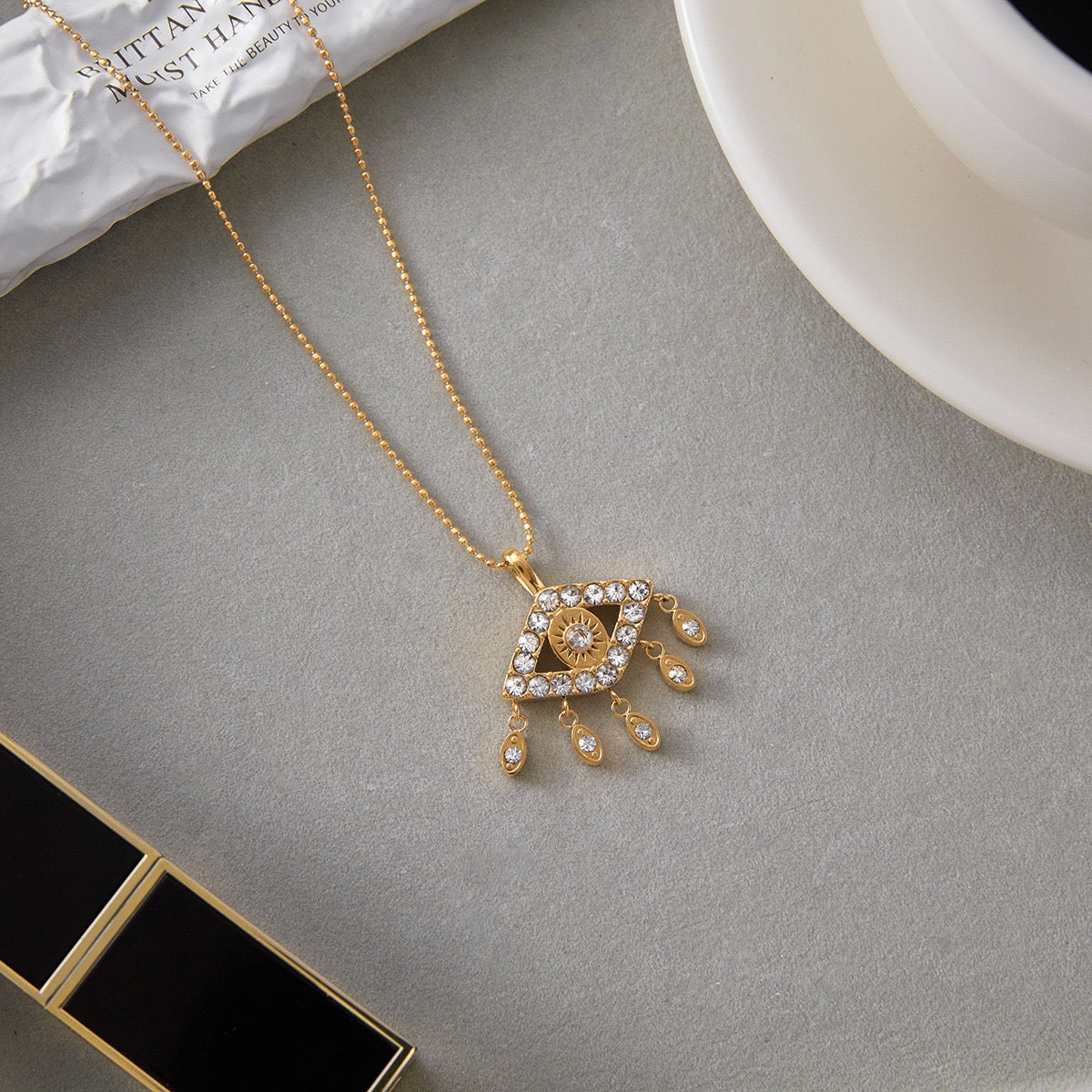 Meaningful evil eye necklace symbolizing protection and strength