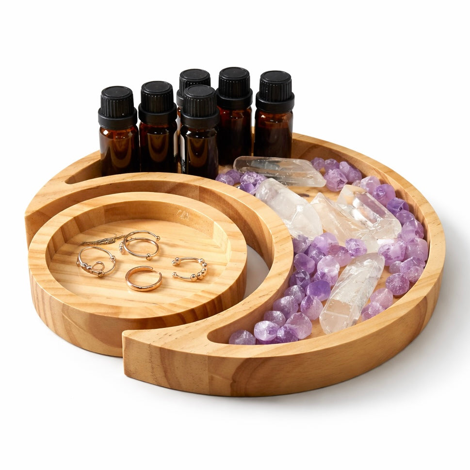 moon and sun healing ritual tray holding essential oils crystals and jewelry for mindfulness rituals

