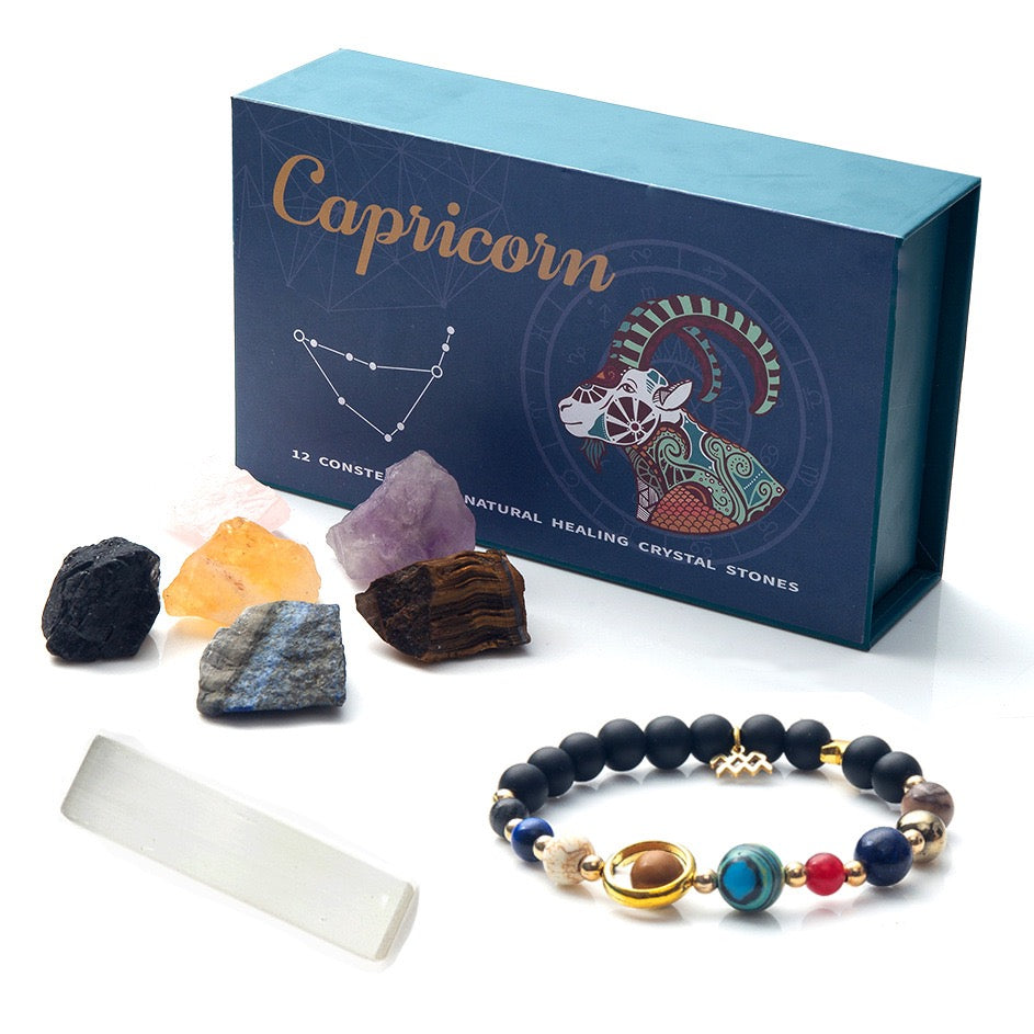 12 zodiac crystal set with natural raw stones, zodiac bracelet, and selenite wand displayed in box