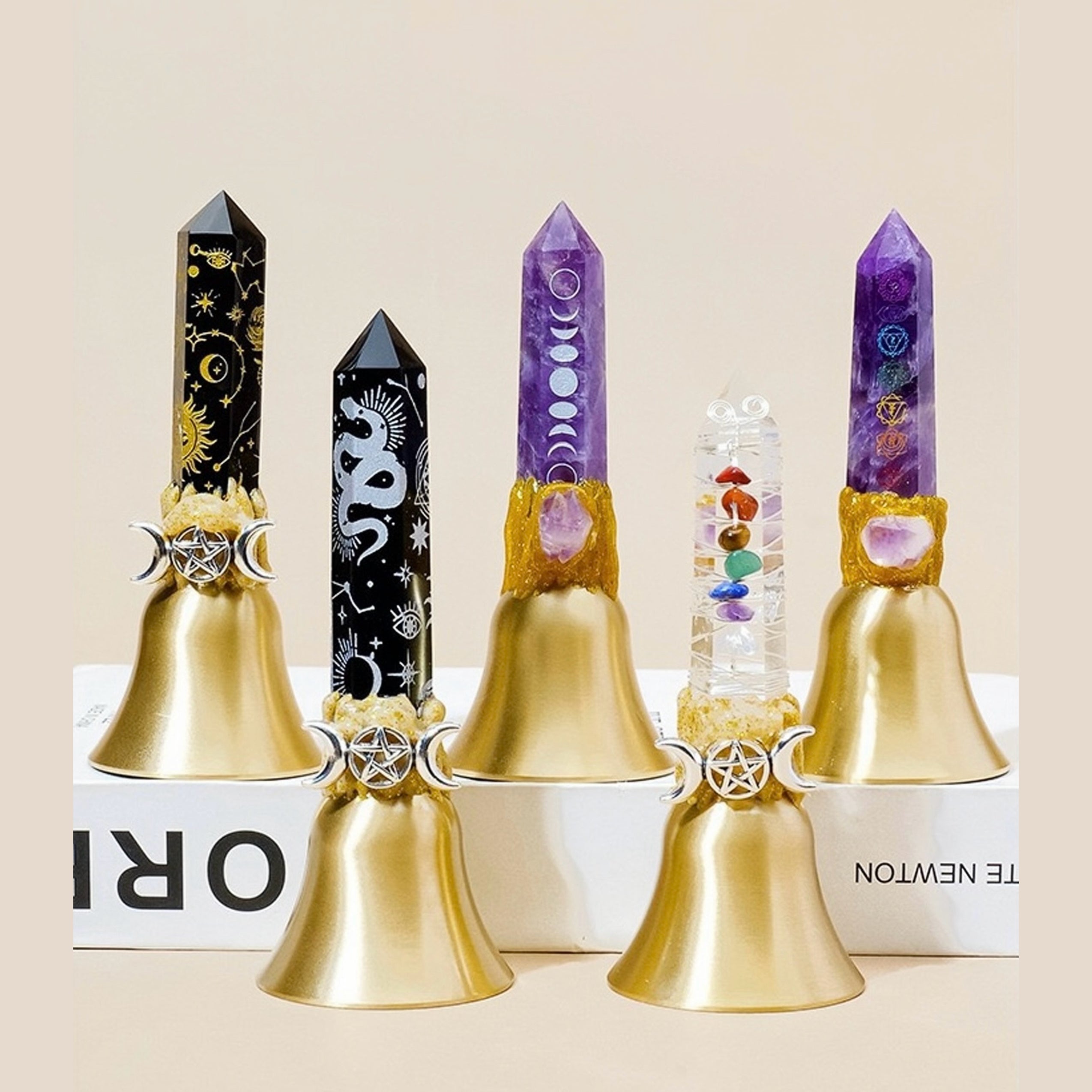 Crystal point bell collection arranged for display